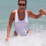 Kourtney Kardashian - White swimsuit-m6cg7a9itd.jpg